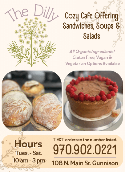 A flyer advertises a cozy cafe offering sandwiches, soups, and salads. The image features a cake and a loaf of bread. AI generated content